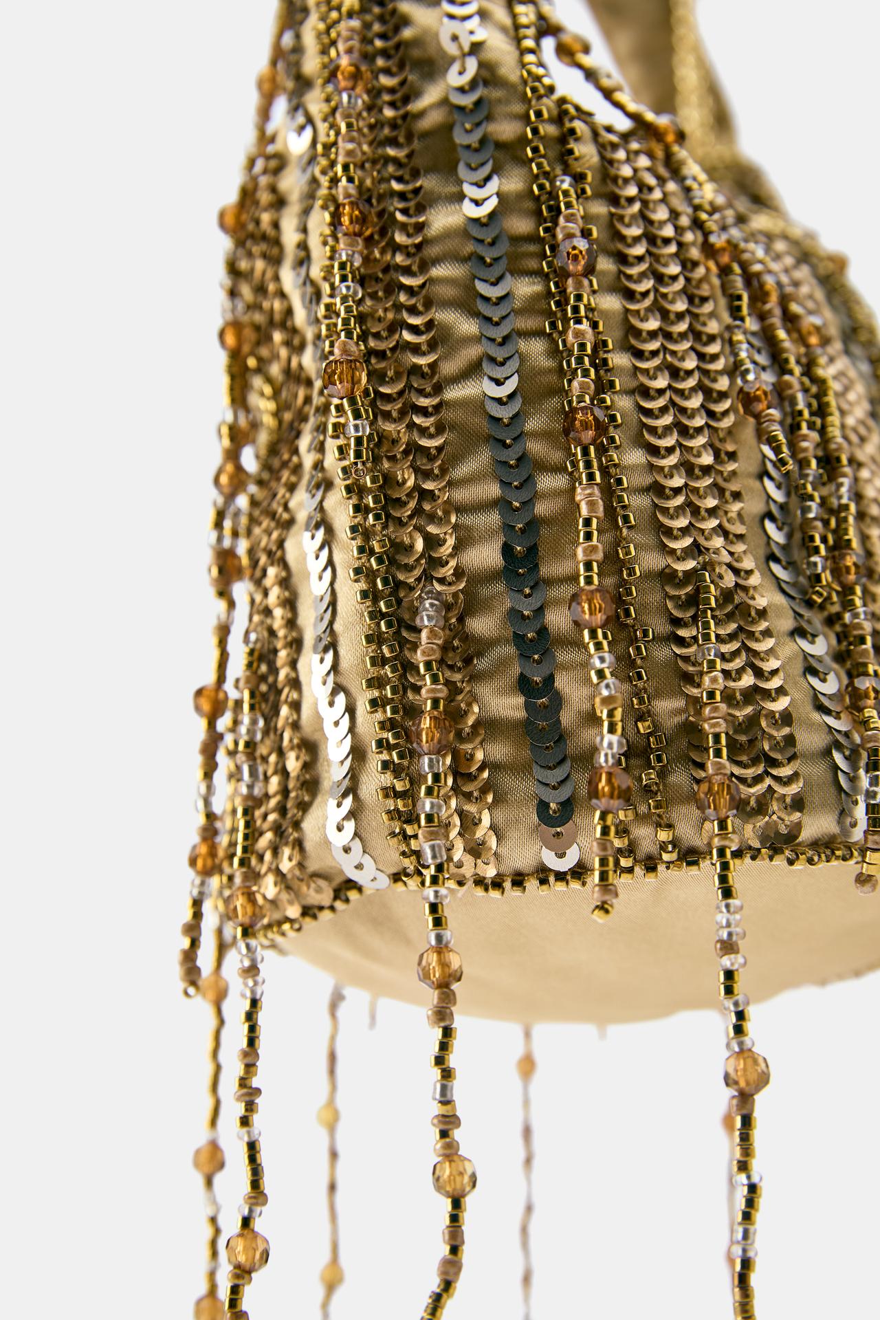 Suede beaded bucket bag — Gold