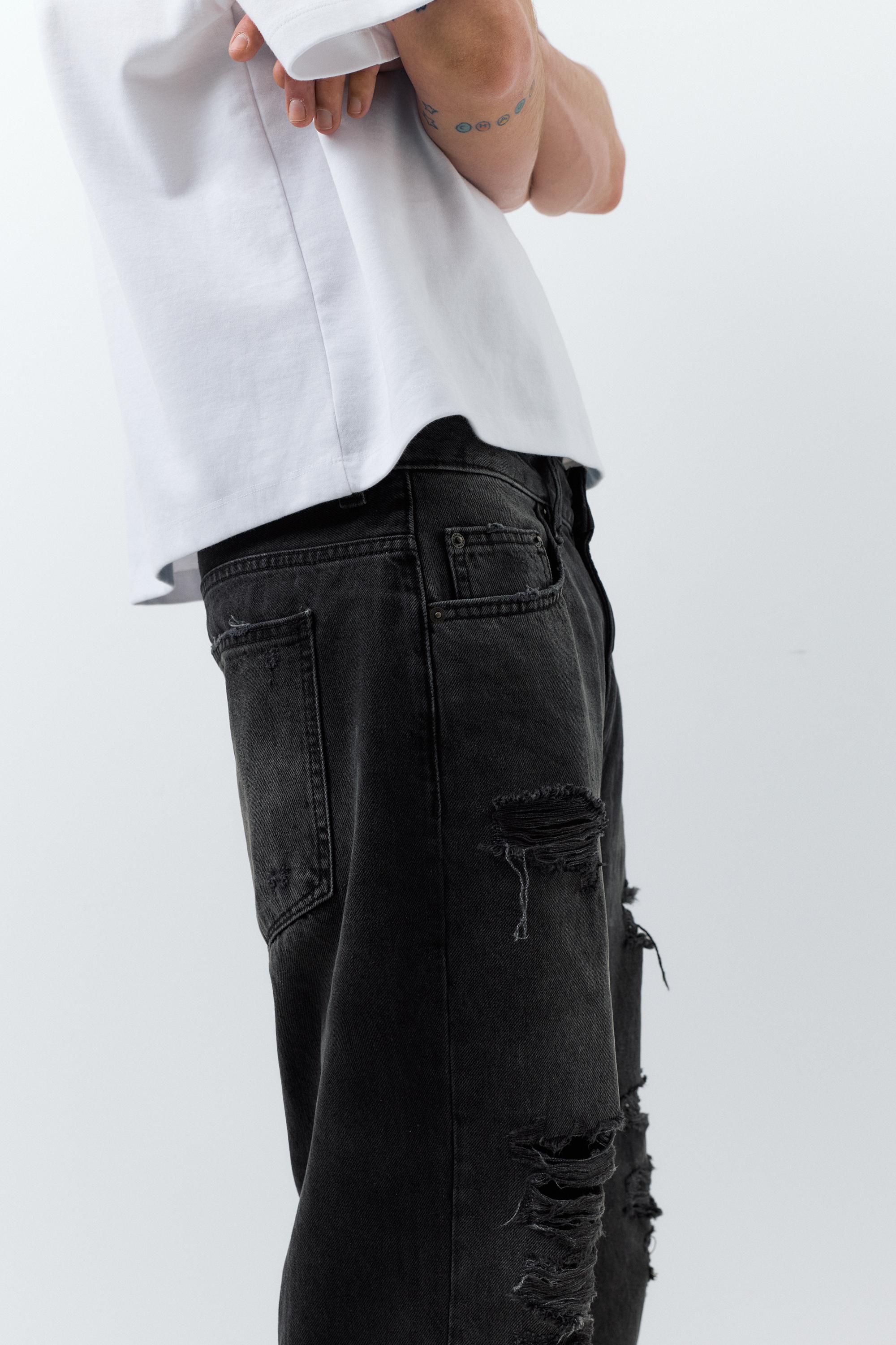Relaxed fit ripped jeans — Faded black