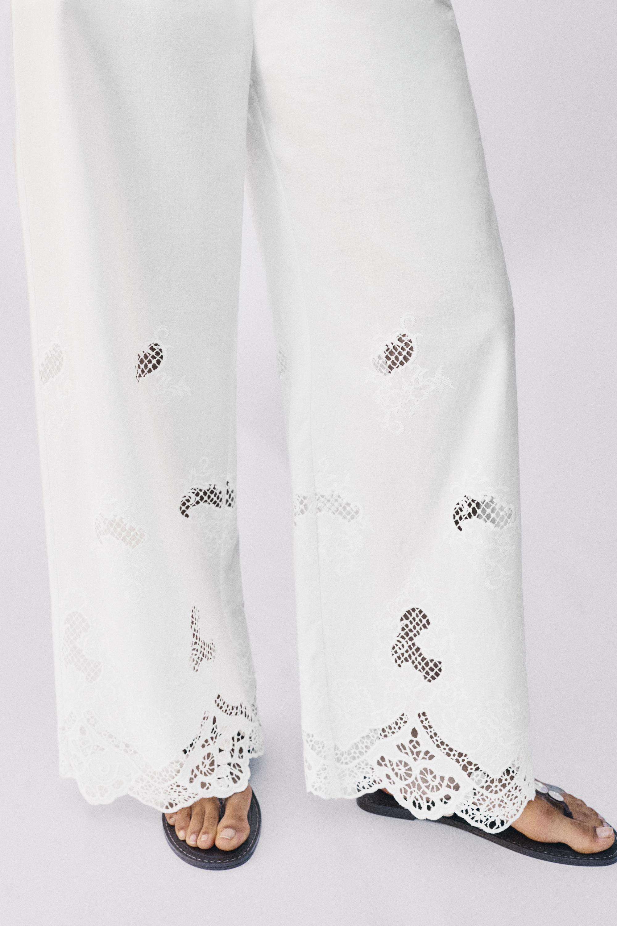 White trousers with Swiss embroidery — White