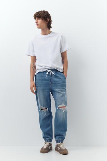 Ripped denim jogger trousers — Pale indigo 1