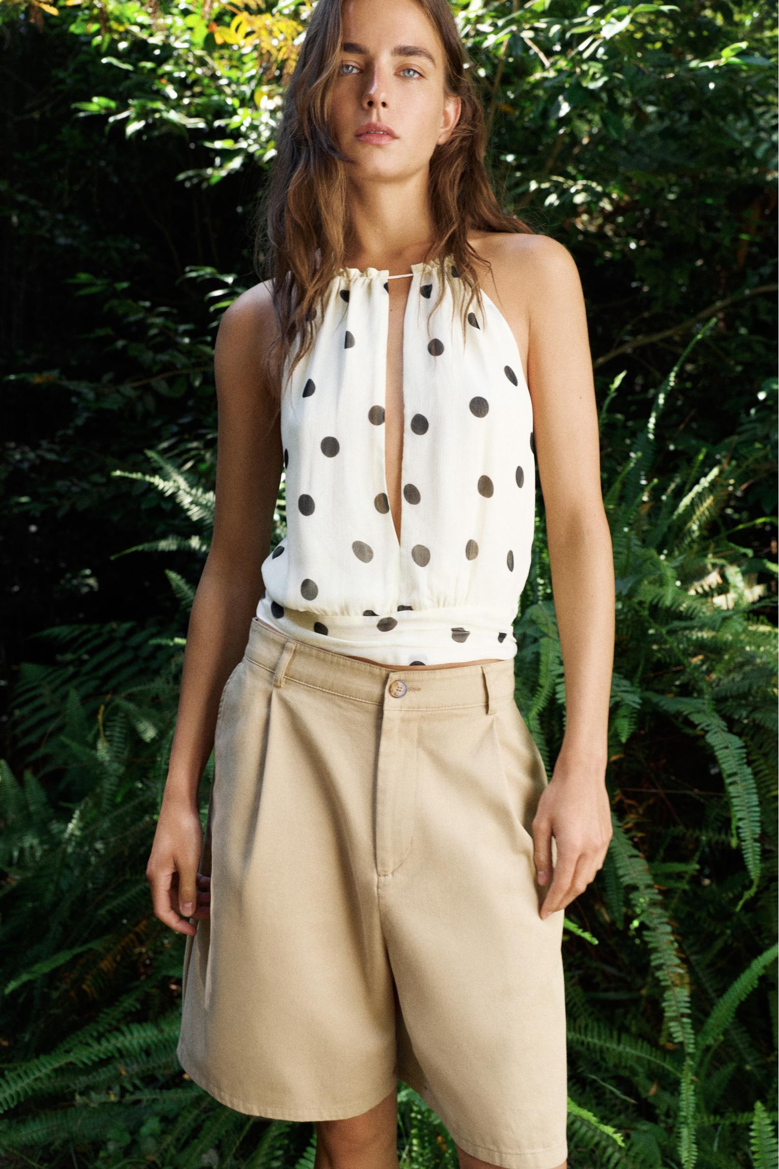 Polka dot halter top with cutout — White