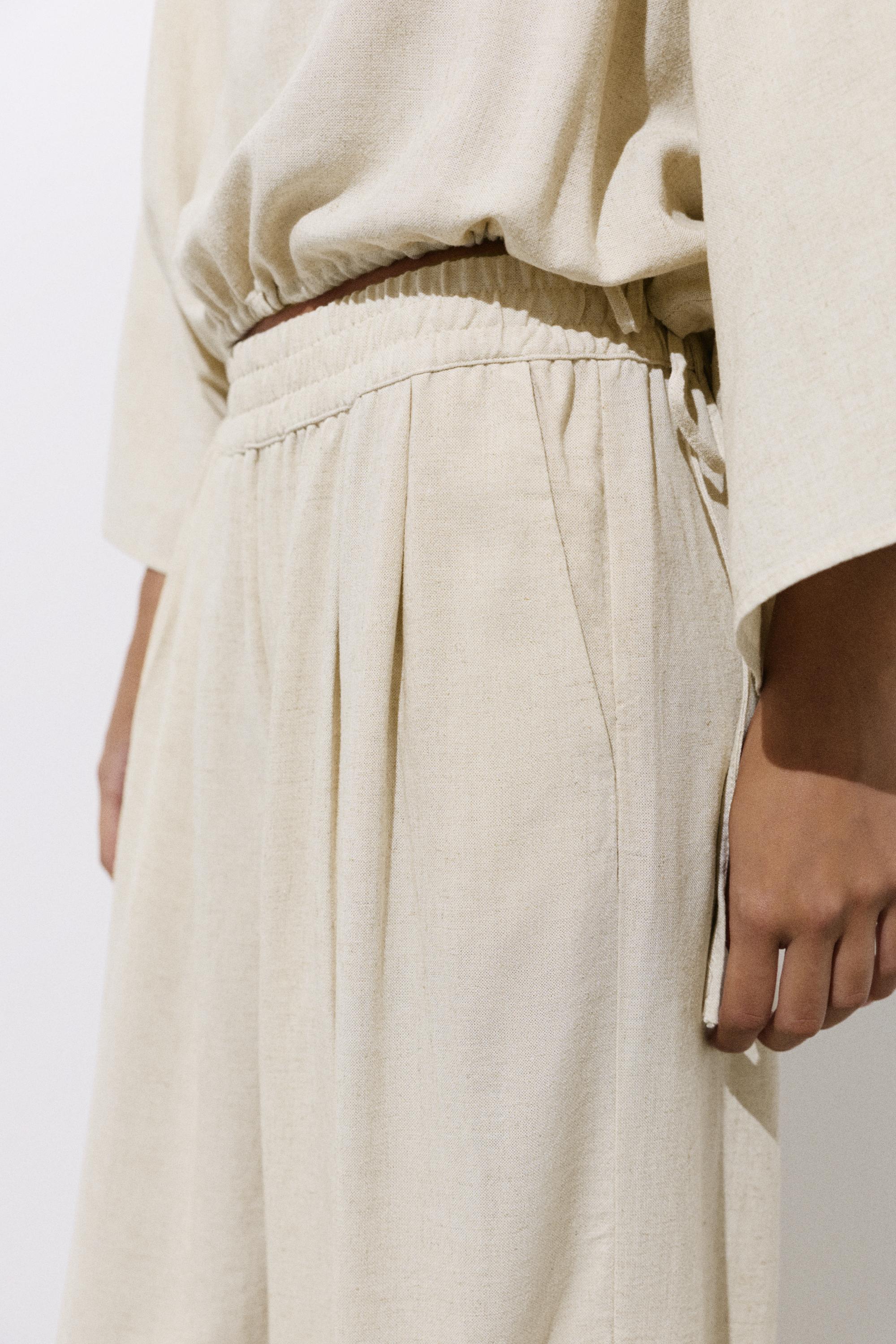 Flowing darted trousers — Sand