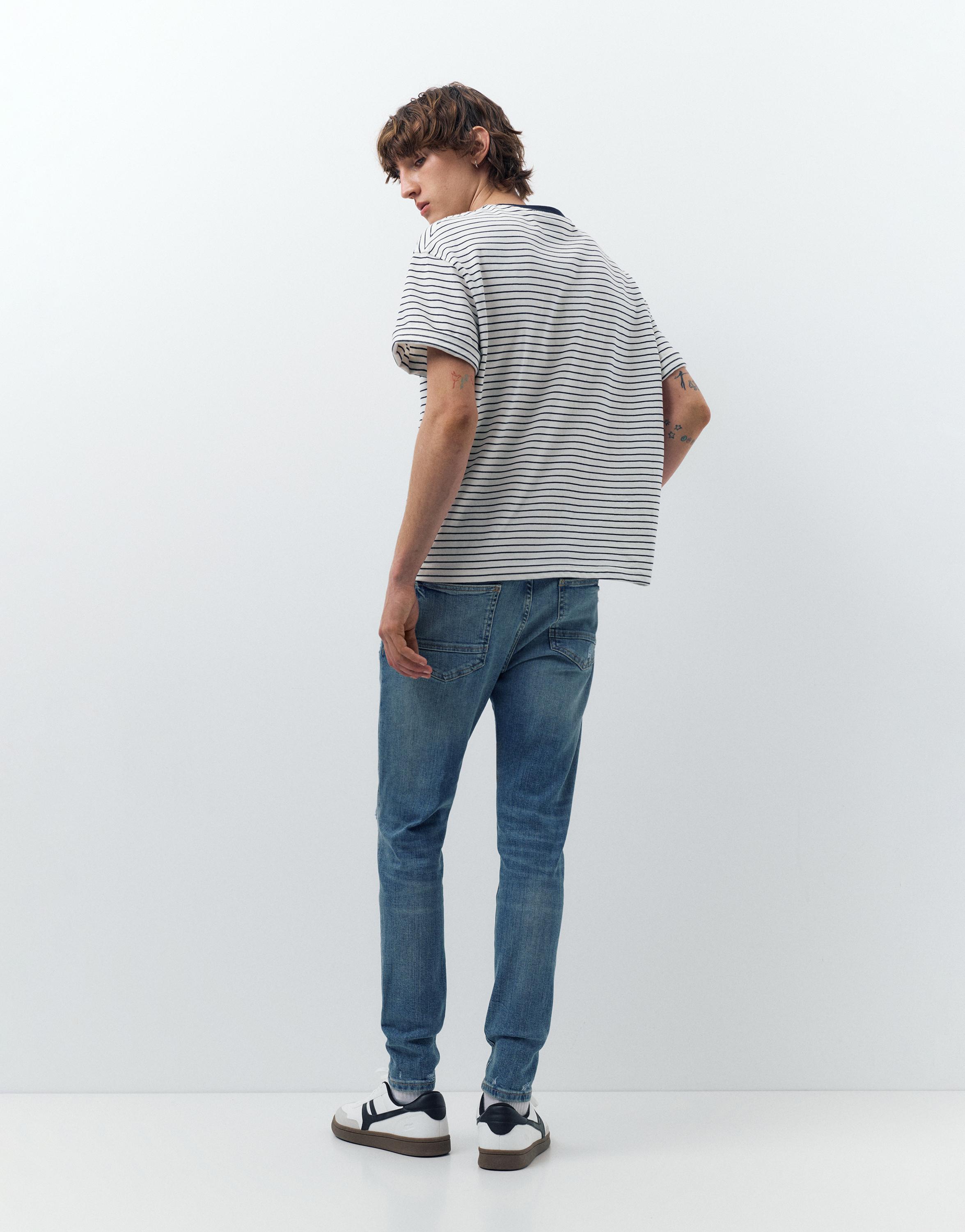 Ripped skinny jeans — Medium blue
