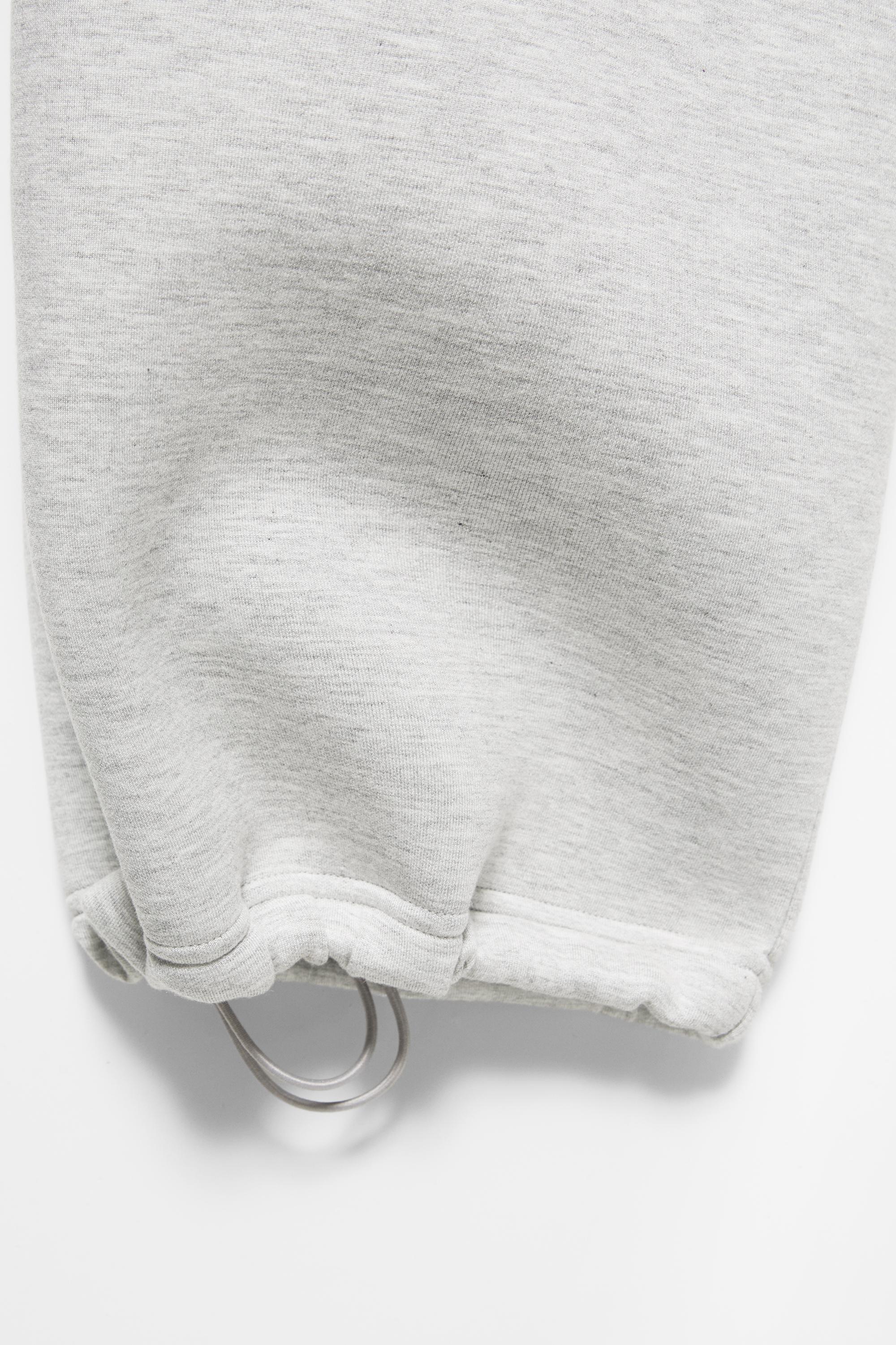 Neoprene-effect baggy trousers — Grey marl